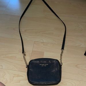 Black over the shoulder Michael kors bag